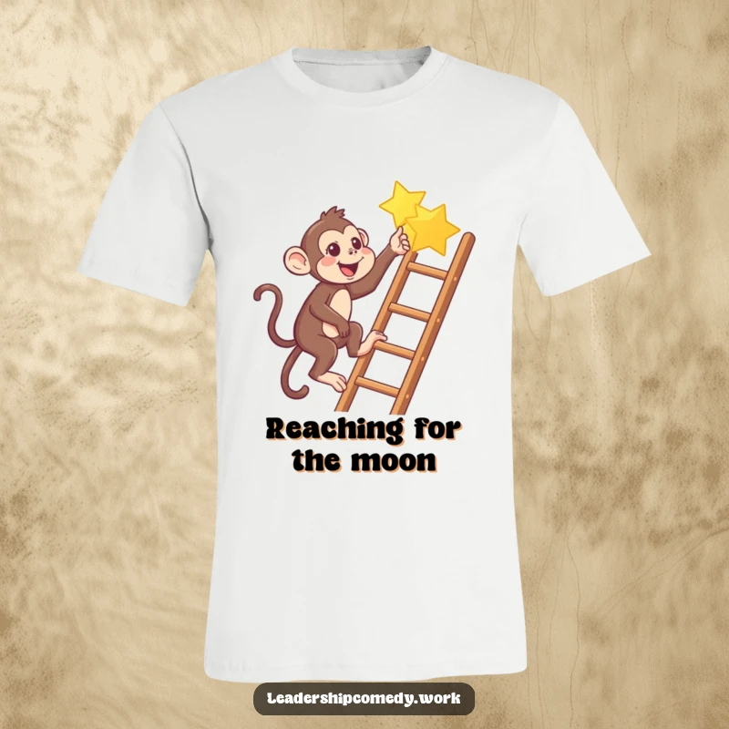 Funny Monkey climbing ladder t-shirt, pointing to a star, expressing humor and aspiration.